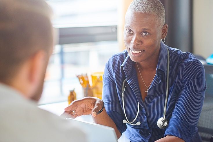 Doctor Talking To Patient No Lab Coat