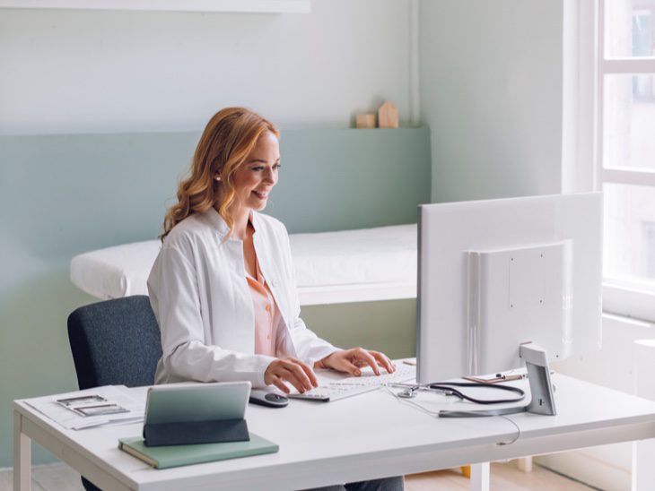 Doctor At Desk