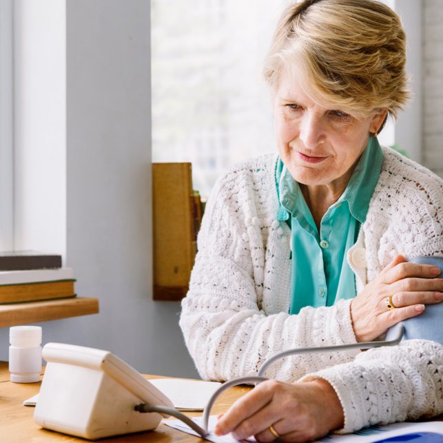 woman taking blood pressure