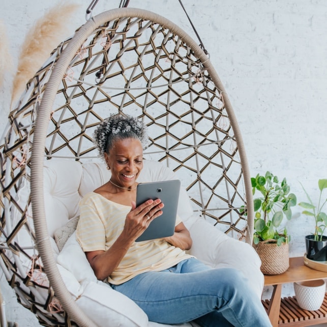 Woman In Hanging Chair