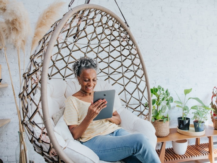 Woman In Hanging Chair