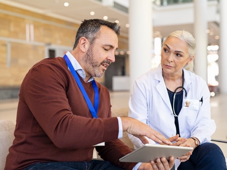 Business person demonstrating RPM to physician